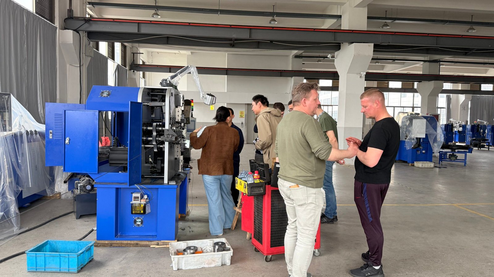 Ukraine customer factory visit and CNC8660 spring coiling machine training at YF Yinfeng